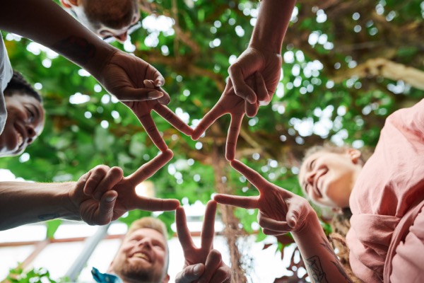 low-angle-photo-of-people-s-fingers-doing-star-shape-3228689